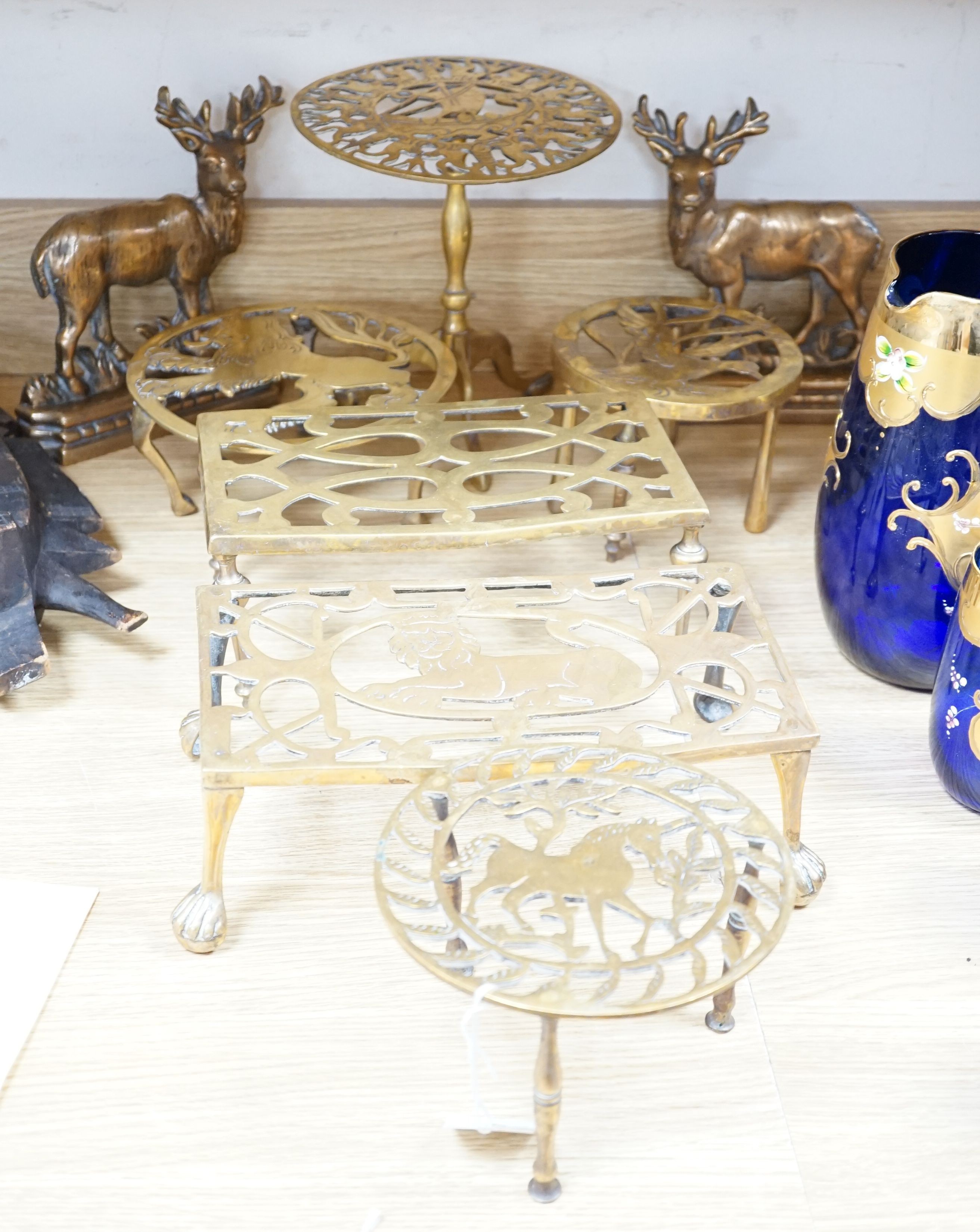 Assorted brass trivets and other brassware